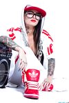 Extravagant bad girl Christy Mack poses in sexy Hip-Hop style clothing