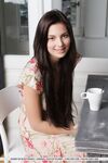 Brunette Euro babe with sexy legs spreading shaved teen pussy