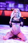 Attractive blonde Luna Star stripping out off her black dress showing her body