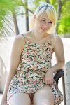 Young blonde girl flashes no panty upskirt and tits on public property
