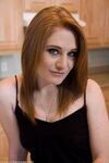 Horny housewife Lucy Fire tries out a sex machine on her tattooed pussy