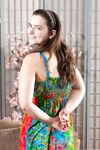 Alluring brunette Snow exposes & spreads her hairy pussy in the living room