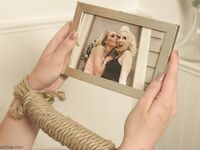Two blonde dommes train the new sub with a whip & strapon in hot lezdom action