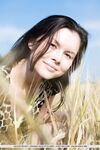 Russian teen Gia B strips bare in farmer's field for nude modeling session