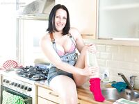 Hairy brunette amateur Amber L getting nasty and pissing in her kitchen