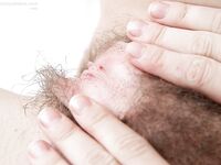 Cute blond first timer Nicole D fingering her hairy bush in bedroom