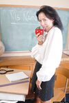 Naughty granny Nancy gets completely naked in the school room