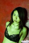 Long legged asian girl Sumire showing her breasts and hairy pussy