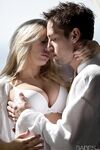 Stocking clad Tasha Reign displaying big tits while receiving oral and anal
