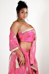 Indian female Keira unveils her big natural tits in bikini bottoms
