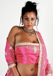 Indian female Keira unveils her big natural tits in bikini bottoms