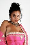 Indian female Keira unveils her big natural tits in bikini bottoms