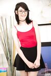Nerdy brunette gets cum on her glasses after sucking off a cock