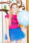 Young looking girl sports a no panty upskirt before getting nude amid balloons