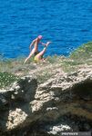 Lusty Baywatch babe got her all holes penetrated and facialed at the beach