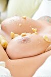 Glamorous babe Charlotte titty fucks a banana & smashes it on her big boobs