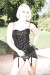 Femdom girl Ash Hollywood playing with strapon in outdoor domination session