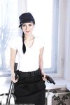Young brunette officer Helena Black flashes naked pussy & toys with nightstick