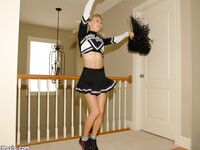 Adorable blonde teen Kasia exposes her big tits in cheerleader uniform
