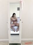 Delightful short brunette Keira Croft spreading her cheeks in a hotel room