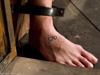 Nerdy mom Holly Heart gets her big fake tits & pussy punished in the stocks