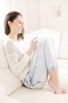 Sexy teen slides out of her jeans to spread & masturbate naked on the couch