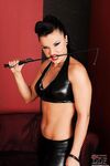 Harsh lesbian is spanking her slave girl's ass as a punishment