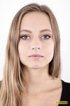 Tall teen Eliska stands totally naked while making her nude modeling debut