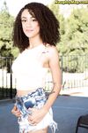 Cute amateur ebony Ariana Aimes reveals natural big tits & fingers outdoors