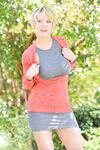 Blonde MILF Dee shows her beautiful big tits and bald twat in public places