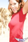 Teen amateur Brittany Maree places hands over her naked breasts while outdoors