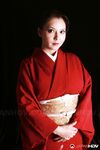Japanese model Yuki Tsukamoto fondles her firm boobs as she gets naked