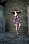 Bella Rossi is tied down and suspended in a variety of hardcore bondage poses