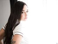 Alluring solo girl Karlee Grey reveals her nice melons as she undresses