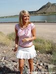 Blonde teen Spring Thomas exposes her bare ass on a public sidewalk