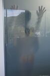 Brunette Beata Undine rubs big wet tits with busty pal in shower girl on girl