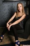 Barely legal blonde removes black leggings on way to modelling in the nude