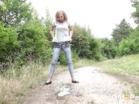 Hot blonde Rose can't find a bathroom so she squats to pee along the path
