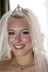 Blonde bride Katie Summers doffs her wedding dress & poses topless in lingerie