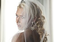 Blonde bride Katie Summers doffs her wedding dress & poses topless in lingerie