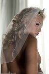 Blonde bride Katie Summers doffs her wedding dress & poses topless in lingerie