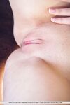 Long legged blonde teen Kery unsnaps her bodysuit for classy nude poses