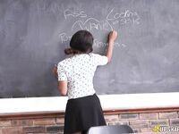 Ebony schoolteacher Kiki Minaj sports the no panty upskirt look on her desk