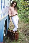 Solo girl Jennifer Nexus flashes her tits before getting on the bus