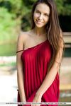 Beautiful teen Alisa Amore disrobes for nude solo poses near a dam