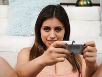Adorable American gamer Ella Knox blows fat dick after letting her tits out