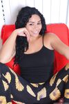 Black first timer Millie Stone smiling while showing her pink pussy