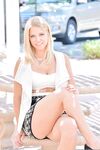 Long legged sexy blonde wearing no panties flashes naked upskirt outdoors