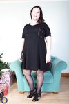 Brunette mom Eva Jayne removes her black dress and flaunts her curves