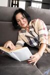 Black haired granny Olivia Westervelt playing with her shaved pussy